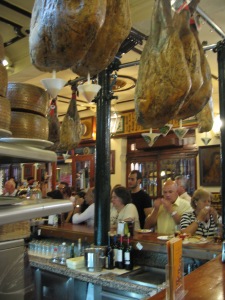 No corner bar is complete without its forest of hanging hams.